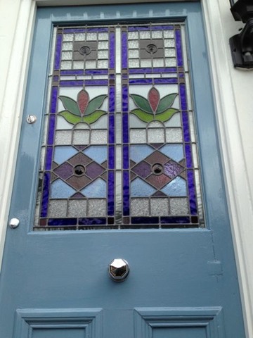Stained glass front door repaired and painted